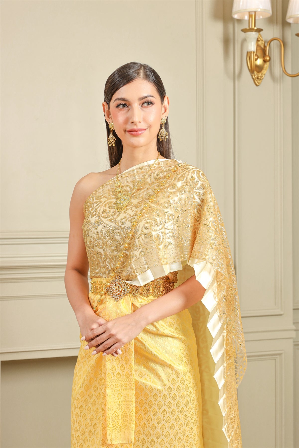 An elegant gold traditional Thai dress.